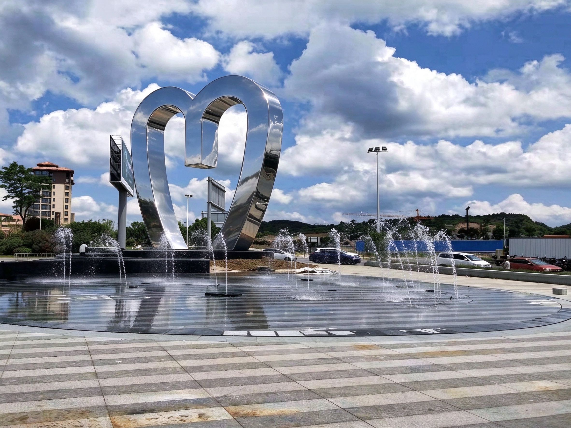 Heart sculpture over fountain